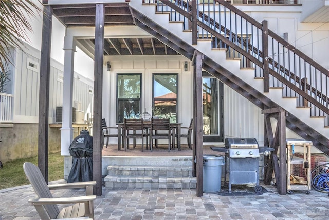 entrance to property featuring a patio area