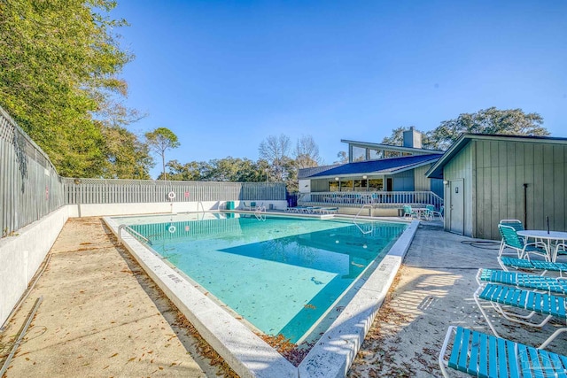 view of swimming pool featuring a patio