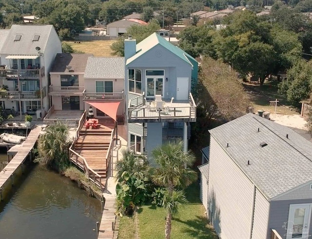 aerial view featuring a water view