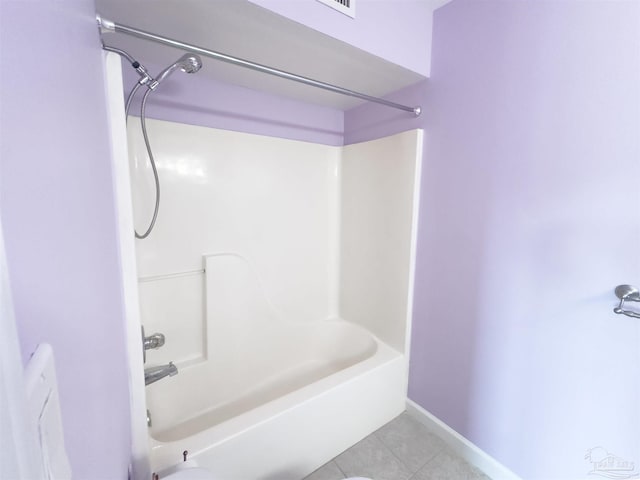 bathroom with shower / bathing tub combination and tile patterned flooring