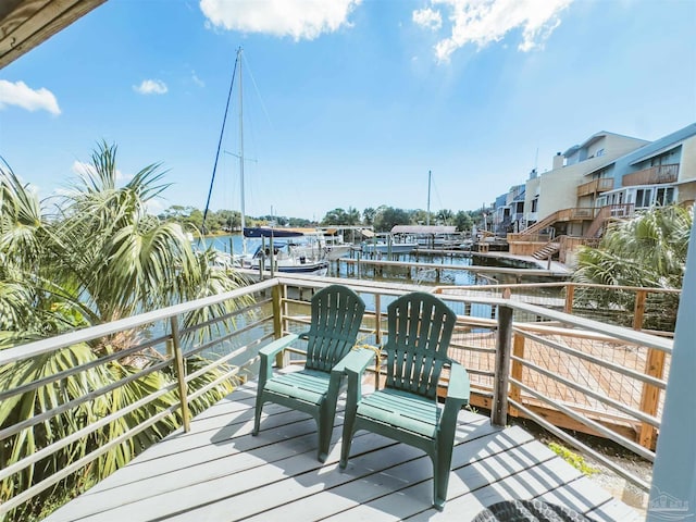 wooden deck with a water view