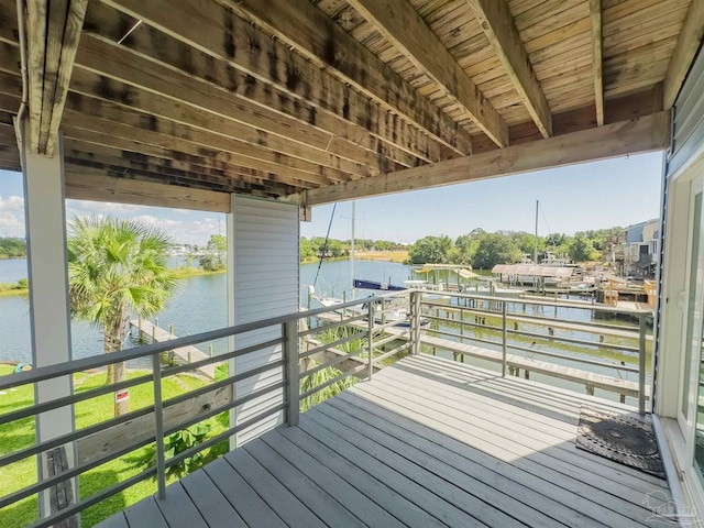 wooden terrace with a water view