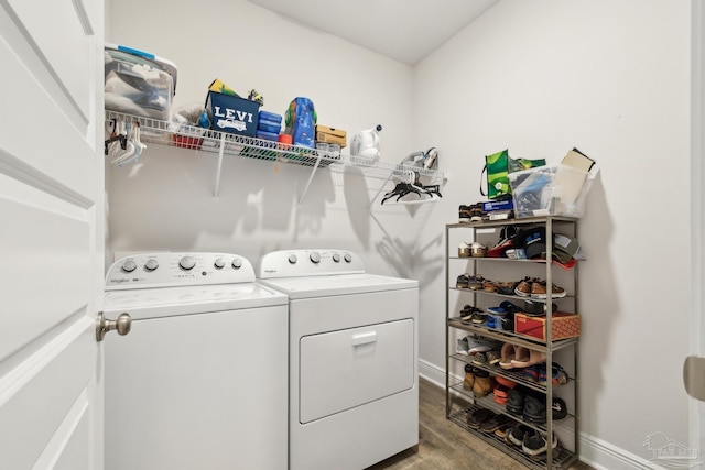 8018 Burnside Loop, Pensacola, FL 32526 - laundry room with separate washer and dryer, wood finished floors, and baseboards