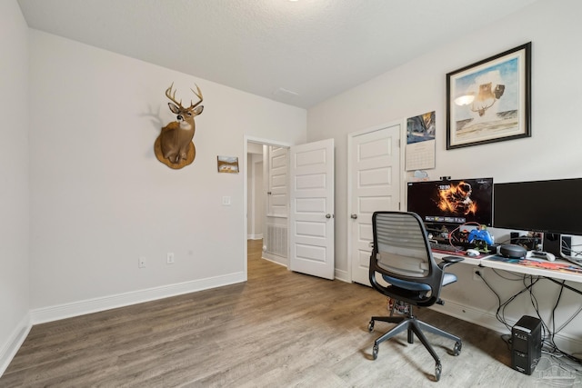 8018 Burnside Loop, Pensacola, FL 32526 - home office with wood finished floors and baseboards