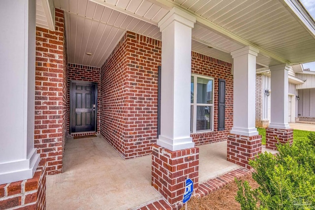 8018 Burnside Loop, Pensacola, FL 32526 - property entrance with covered porch and brick siding