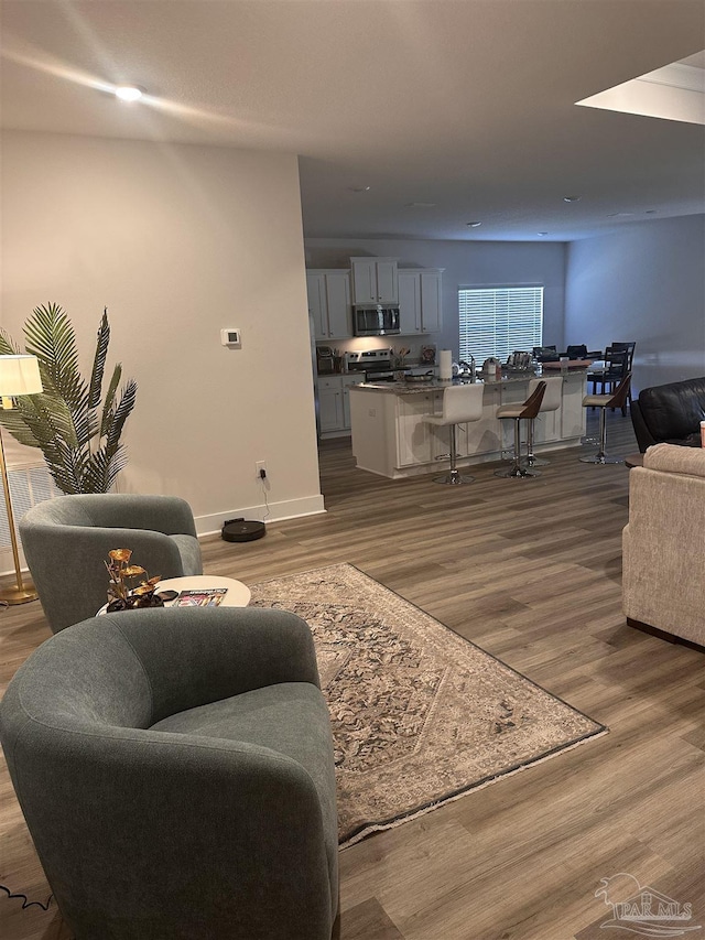 living room with dark wood-type flooring