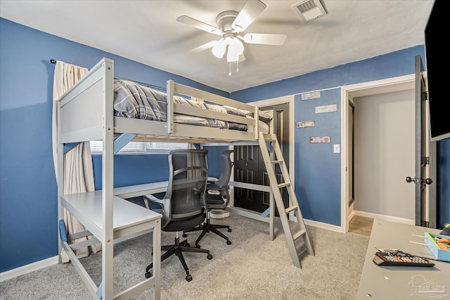 bedroom with ceiling fan and light colored carpet