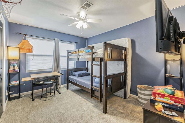 bedroom featuring ceiling fan and carpet flooring