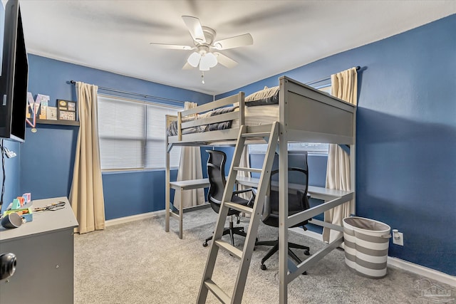 carpeted bedroom featuring ceiling fan