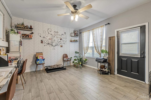 interior space featuring ceiling fan and light wood-type flooring