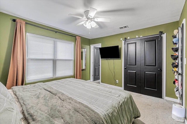 bedroom with carpet floors and ceiling fan