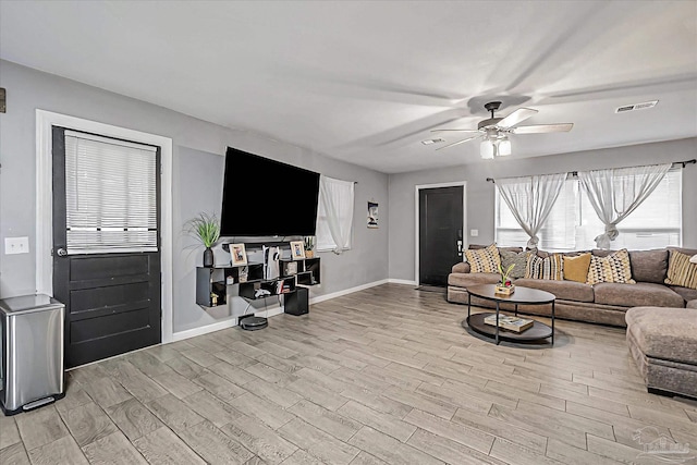 living room with ceiling fan