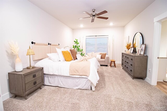 bedroom with baseboards, recessed lighting, ceiling fan, and light colored carpet