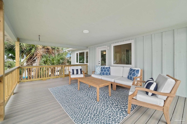 wooden deck with outdoor lounge area