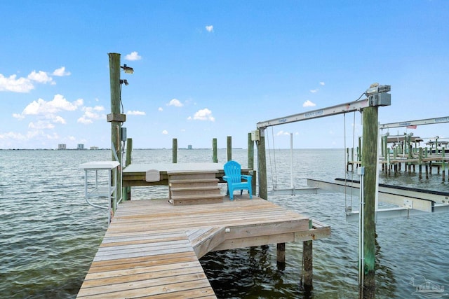 view of dock with a water view