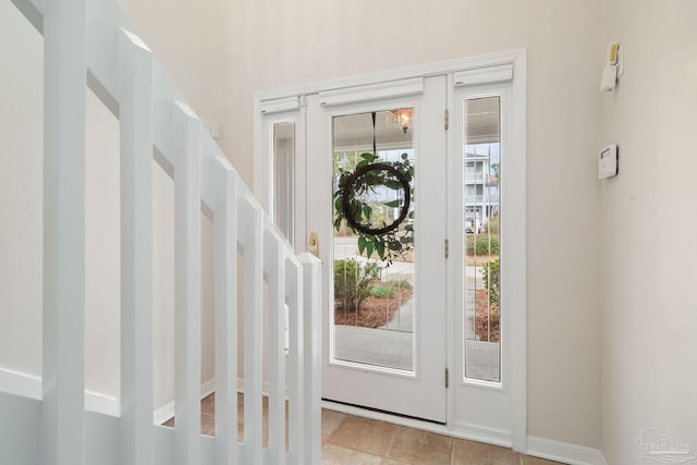 doorway to outside featuring plenty of natural light