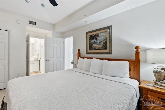 bedroom featuring ceiling fan and connected bathroom