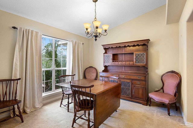 home office featuring an inviting chandelier, baseboards, and light carpet