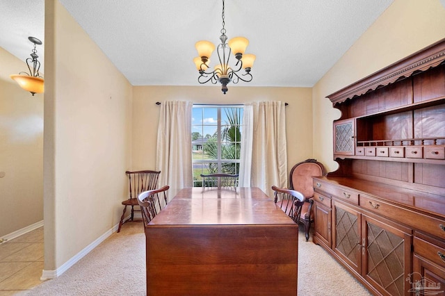 carpeted dining room with a textured ceiling, a notable chandelier, and lofted ceiling