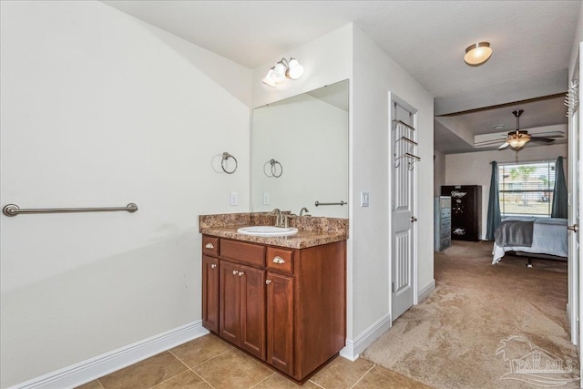 bathroom featuring vanity, tile patterned floors, and ceiling fan