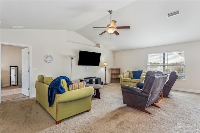 living room with vaulted ceiling, light colored carpet, and ceiling fan