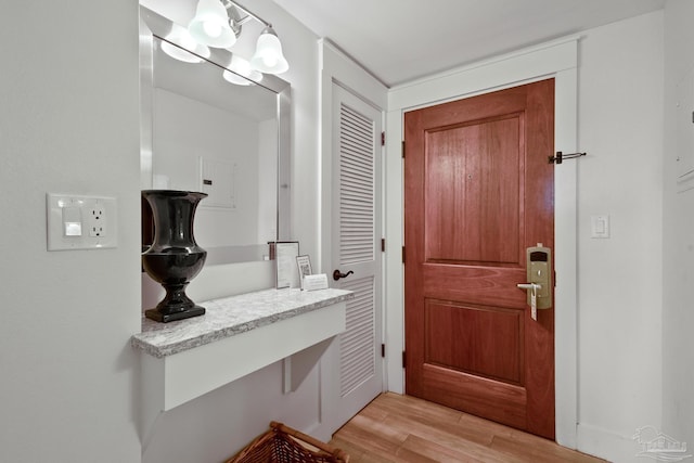 doorway to outside featuring light hardwood / wood-style flooring