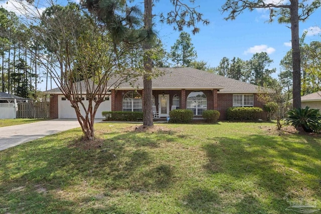 single story home featuring a front lawn, driveway, fence, an attached garage, and brick siding