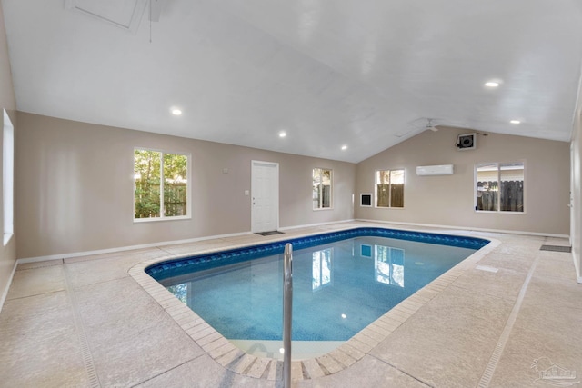 view of swimming pool with an AC wall unit