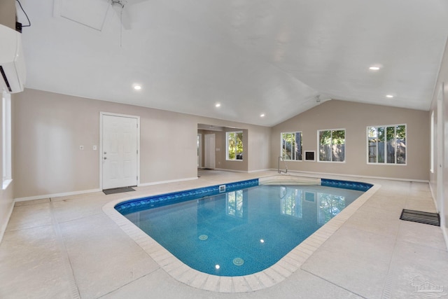 view of pool with a wall mounted air conditioner and ceiling fan