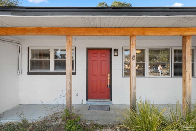 entrance to property with covered porch