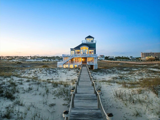 1220 State Highway 180, Gulf Shores, AL 36542 - dock area featuring a balcony and stairway