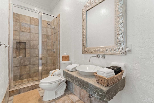 1220 State Highway 180, Gulf Shores, AL 36542 - full bath featuring toilet, a stall shower, a sink, ornamental molding, and a textured wall