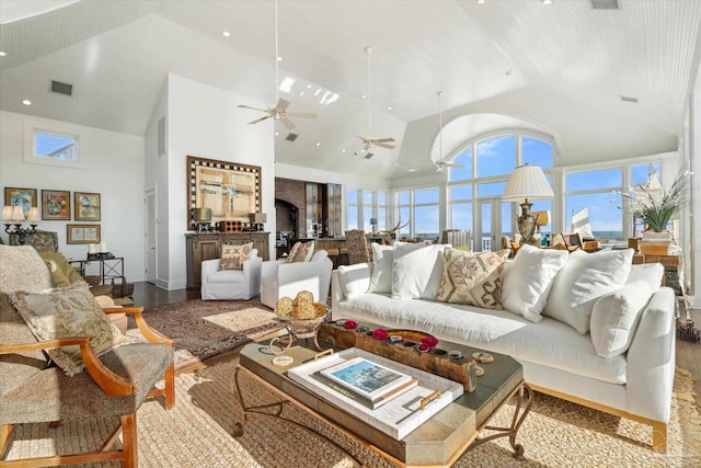 1220 State Highway 180, Gulf Shores, AL 36542 - living area featuring high vaulted ceiling, wood finished floors, and a ceiling fan