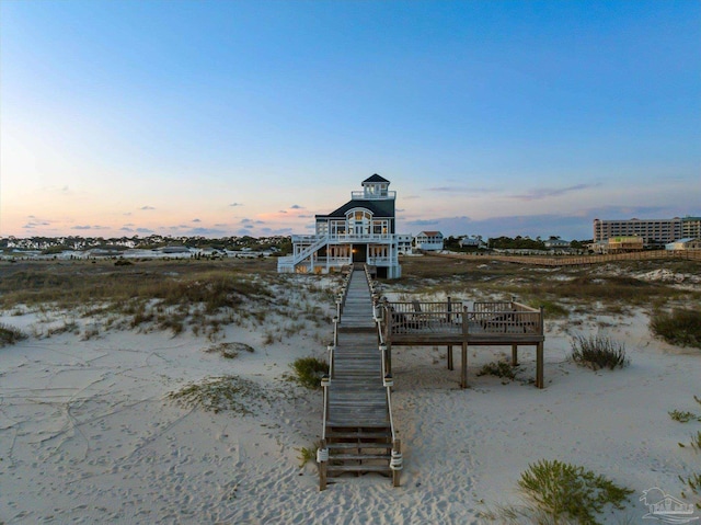 1220 State Highway 180, Gulf Shores, AL 36542 - surrounding community with stairway and a deck