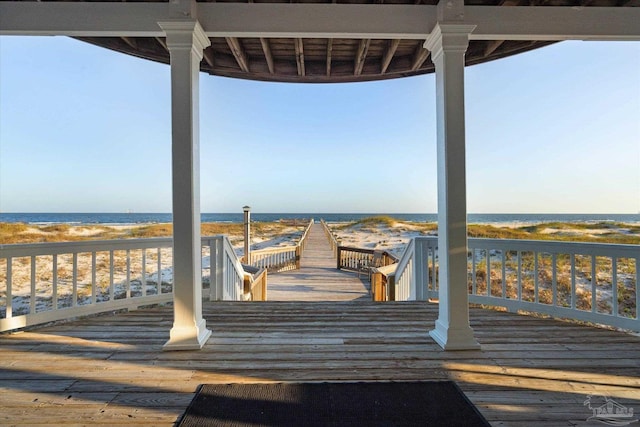 1220 State Highway 180, Gulf Shores, AL 36542 - wooden deck featuring view of water and beach