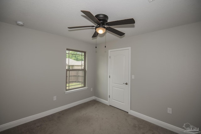 3620 Ranch Dr, Crestview, FL 32539 - spare room with a ceiling fan, a smoke detector, baseboards, and carpet floors