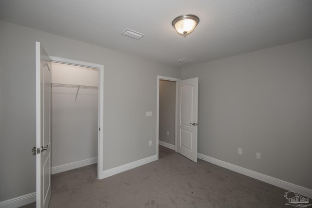 3620 Ranch Dr, Crestview, FL 32539 - unfurnished bedroom featuring carpet flooring, a closet, and baseboards