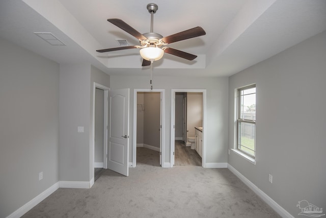 3620 Ranch Dr, Crestview, FL 32539 - unfurnished bedroom with light colored carpet, a spacious closet, and baseboards