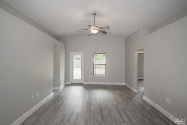 3620 Ranch Dr, Crestview, FL 32539 - unfurnished room with ceiling fan, vaulted ceiling, dark wood-type flooring, and baseboards
