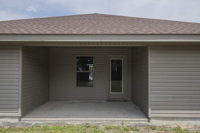 3620 Ranch Dr, Crestview, FL 32539 - property entrance with a patio and a shingled roof
