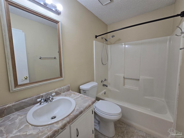 full bathroom with bathtub / shower combination, a textured ceiling, toilet, tile patterned floors, and vanity