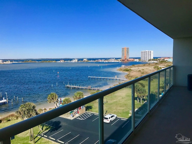 balcony featuring a water view