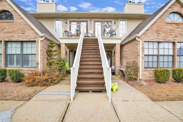 property entrance with a balcony