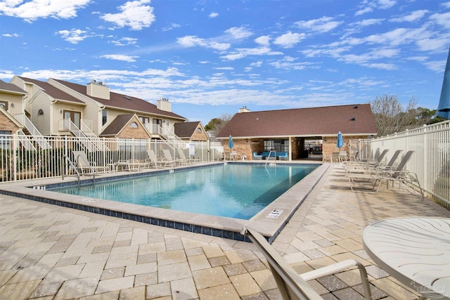 view of pool featuring a patio area