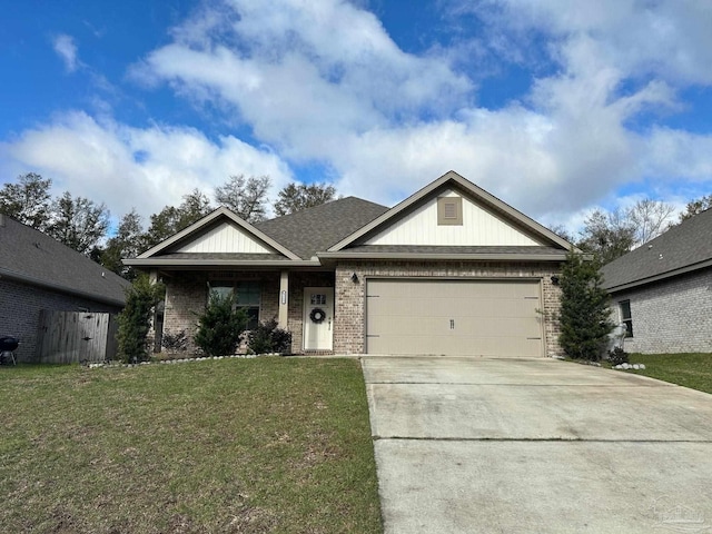 view of front of home featuring a front lawn, an attached garage, brick siding, and driveway