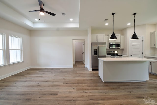 5742 San Blas St, Milton, FL 32583 - kitchen featuring appliances with stainless steel finishes, recessed lighting, ceiling fan, baseboards, and light countertops