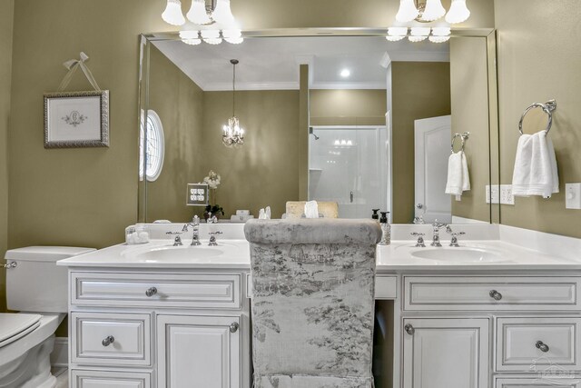 bathroom with a shower with door, an inviting chandelier, vanity, ornamental molding, and toilet