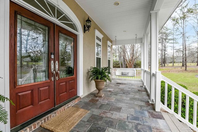 entrance to property featuring french doors