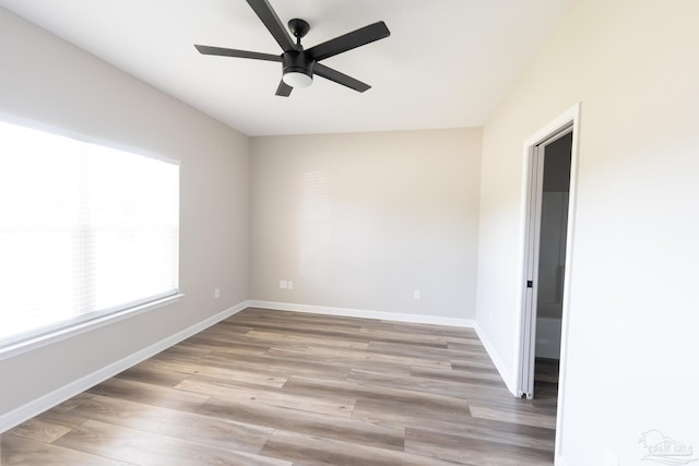 9901 Raymar St Unit A, Pensacola, FL 32534 - unfurnished room with baseboards, a ceiling fan, and wood finished floors