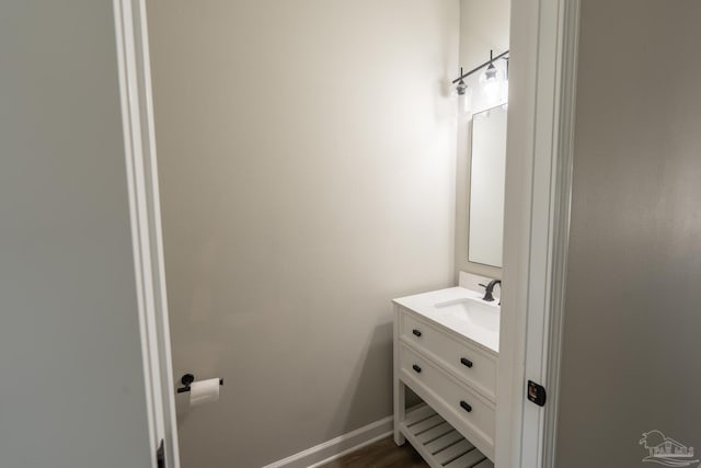 9901 Raymar St Unit A, Pensacola, FL 32534 - bathroom featuring vanity and wood finished floors